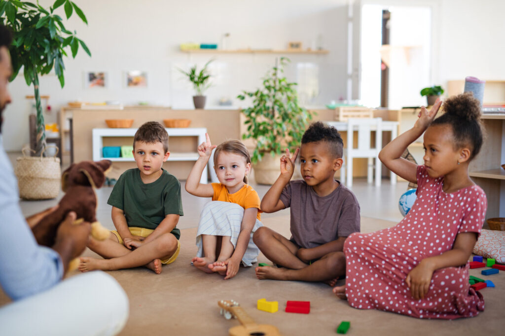 nursery school children with man teacher sitting o 2024 10 18 08 49 11 utc
