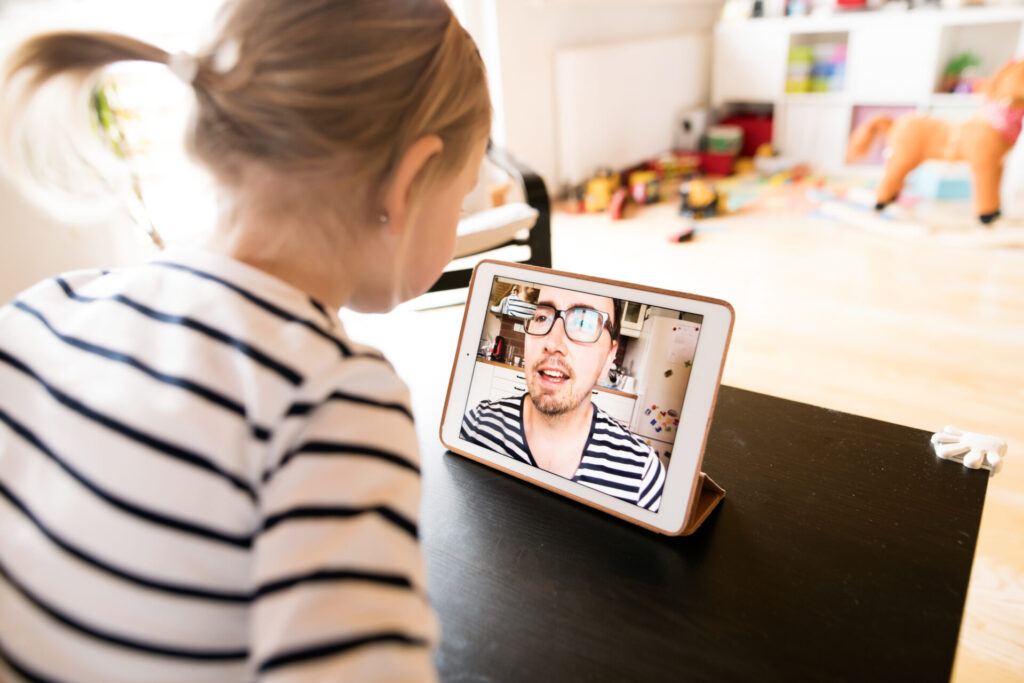 little girl at home with tablet video chatting wi 2024 10 18 09 47 27 utc