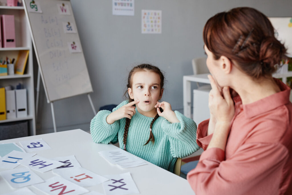 girl with teacher studying at school 2026 01 08 06 27 02 utc